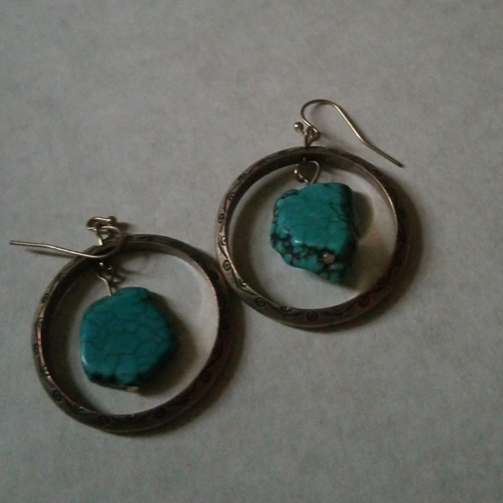 Hoop dangles with stone inset